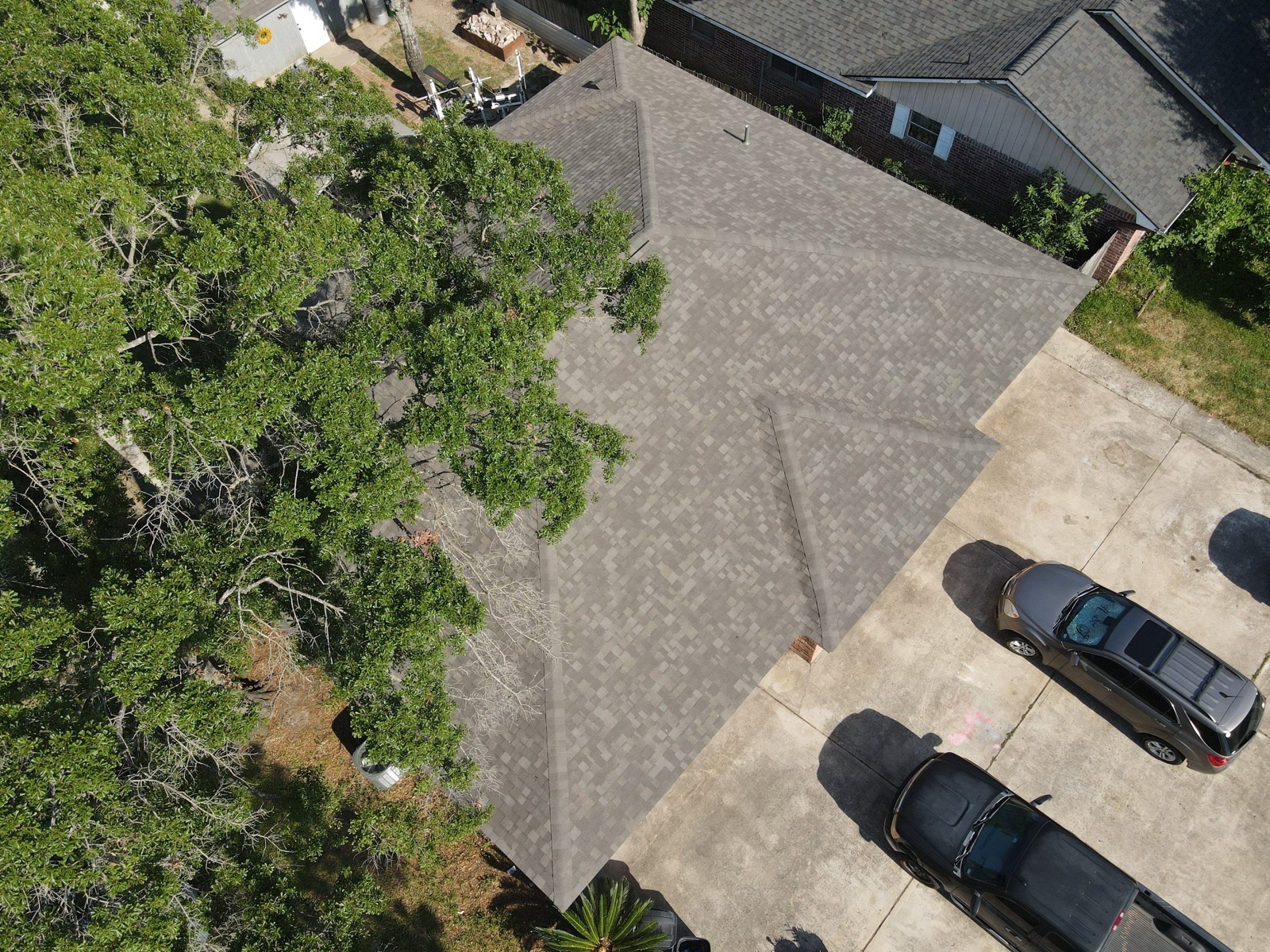 Freshly installed roof on a Houston-area home, aerial view